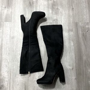 Brand new never worn cute healed boots.
